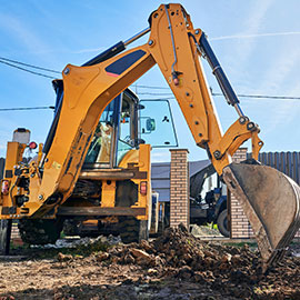 Heavy excavator protected with insurance for plant hire