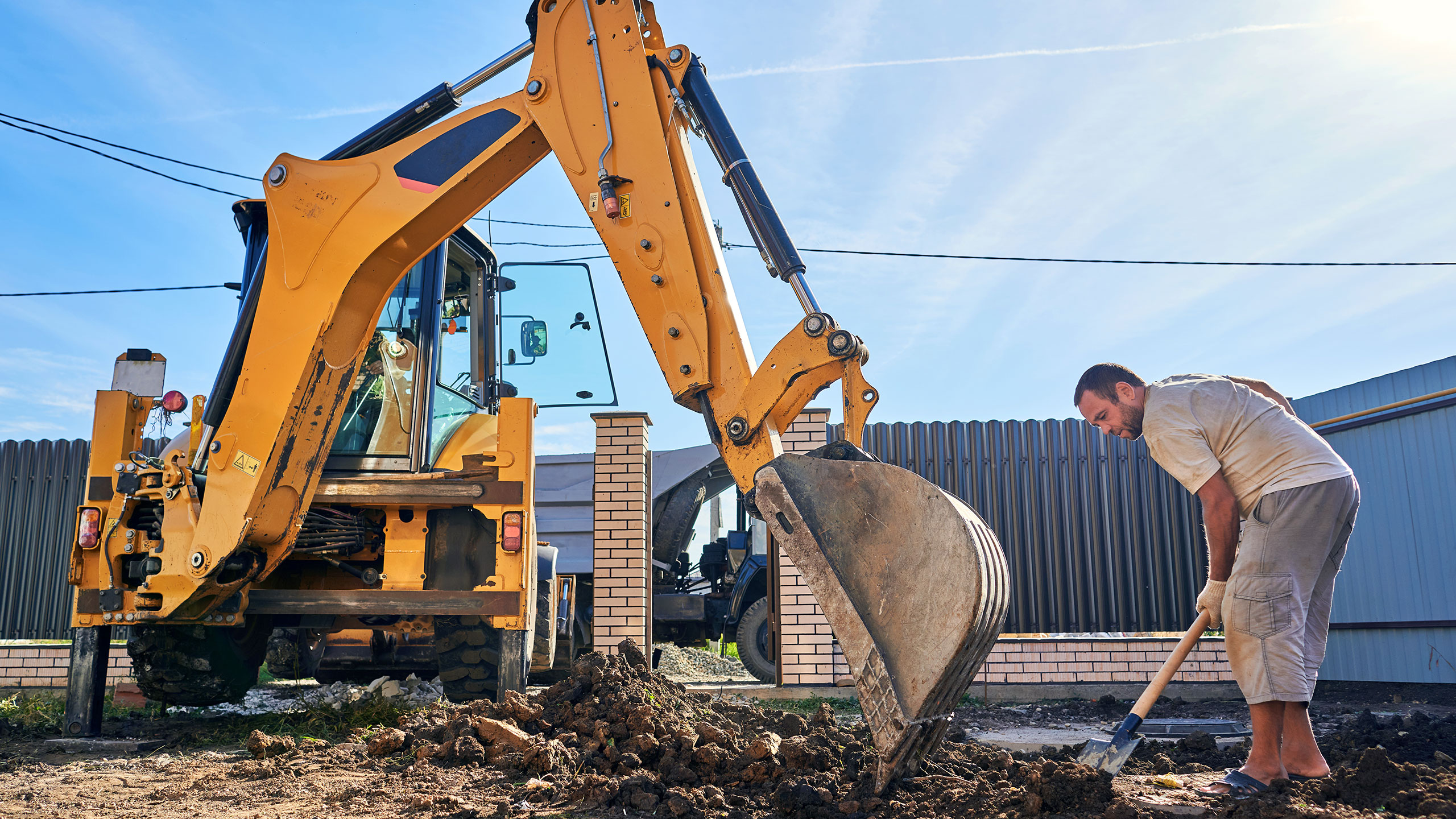 A heavy excavator with excavator hire insurance applied